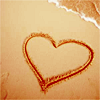 i heart you in sand