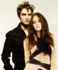 Robert Pattinson as Edward Cullen and Kristen Stewart as Bella Swan