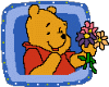 Pooh with a flower